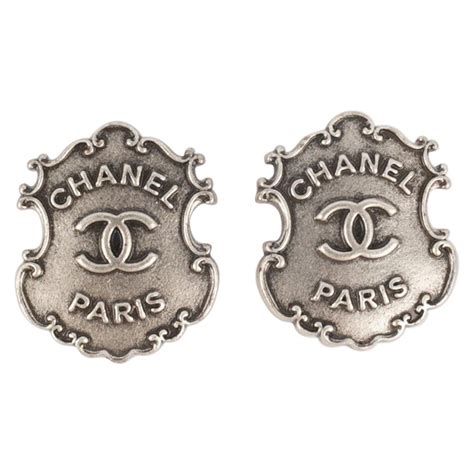 chanel insignia earrings|Chanel pendant earrings.